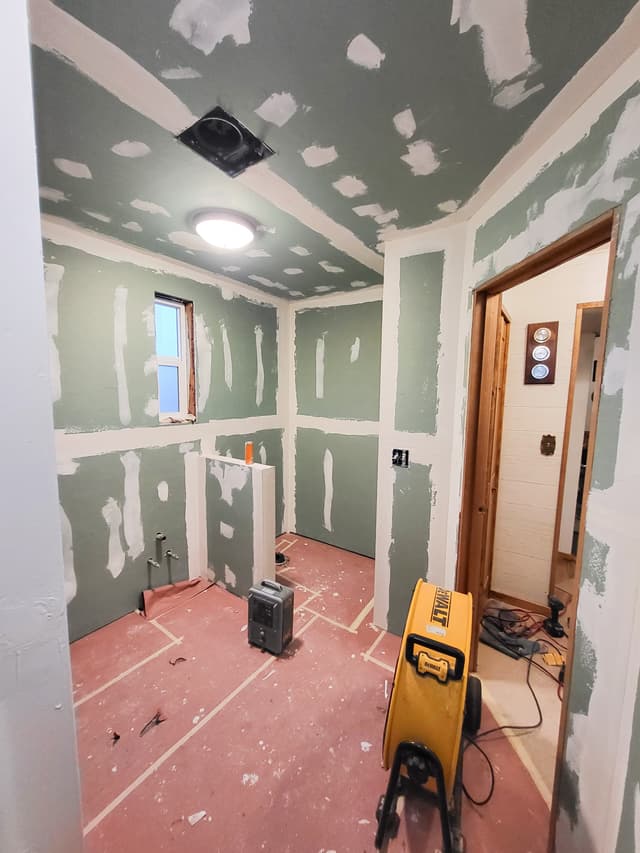 bathroom remodel in progress, new drywall