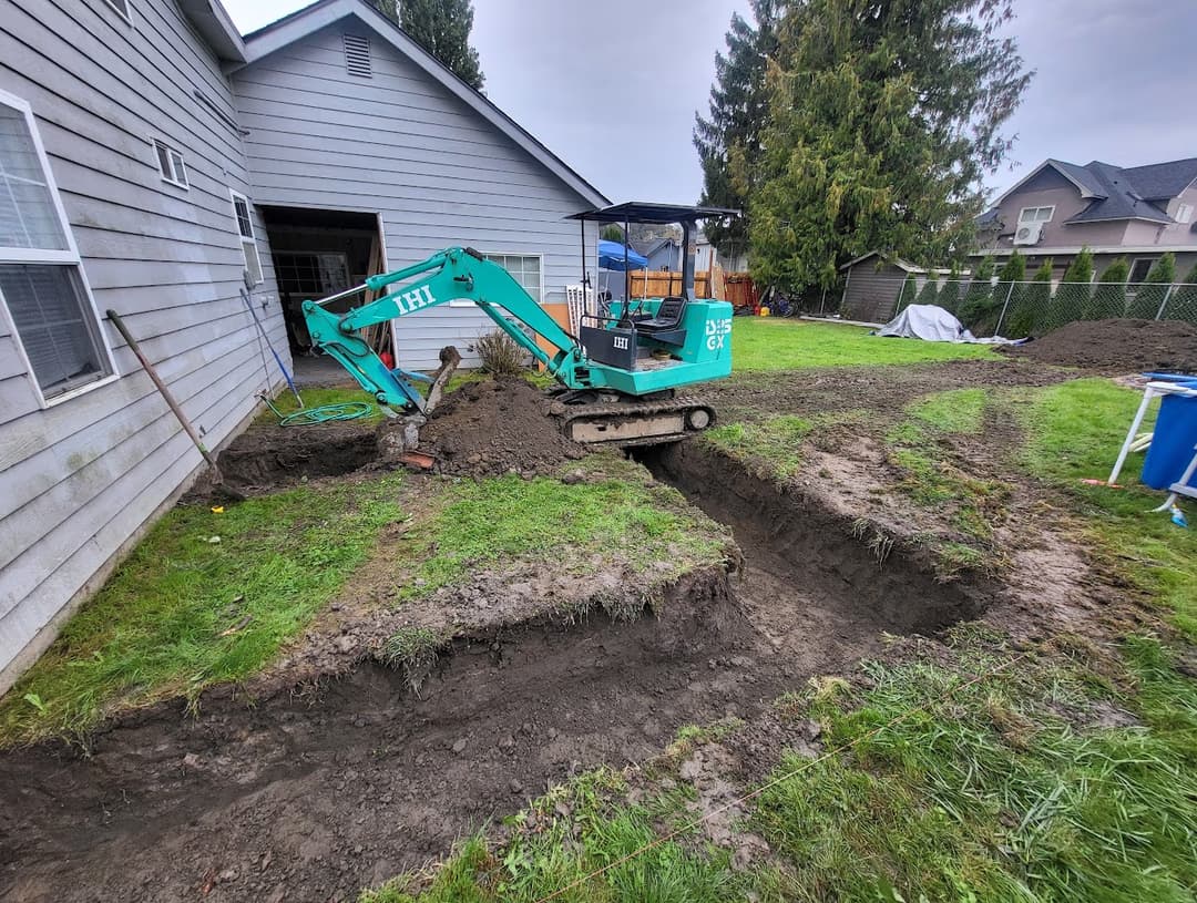 Excavator over a trench