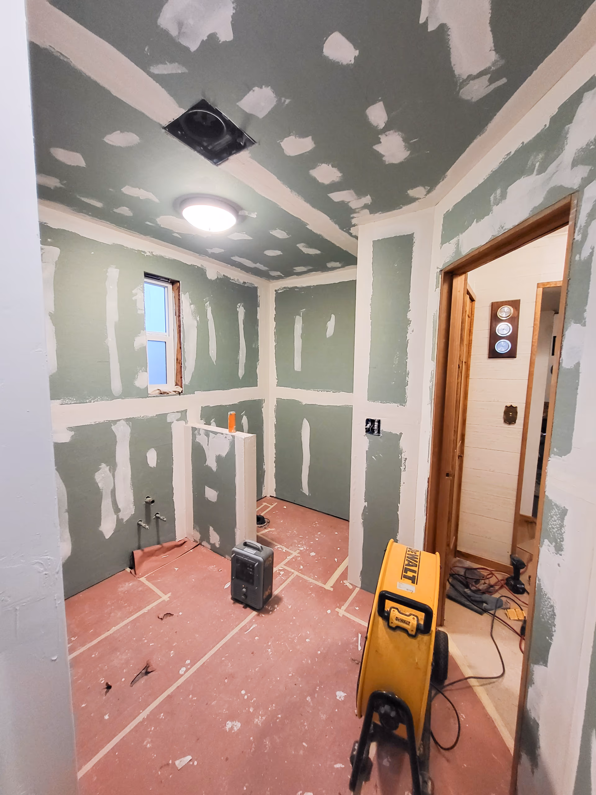 bathroom remodel in progress, new drywall